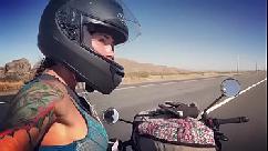 Felicity feline motorcycle babe riding aprilia in reggiseno
